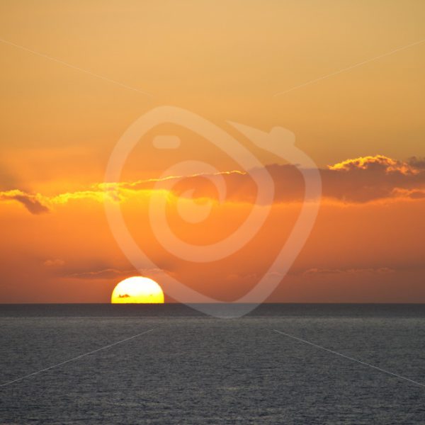 Sunset over the ocean - Nature Stock Photo Agency