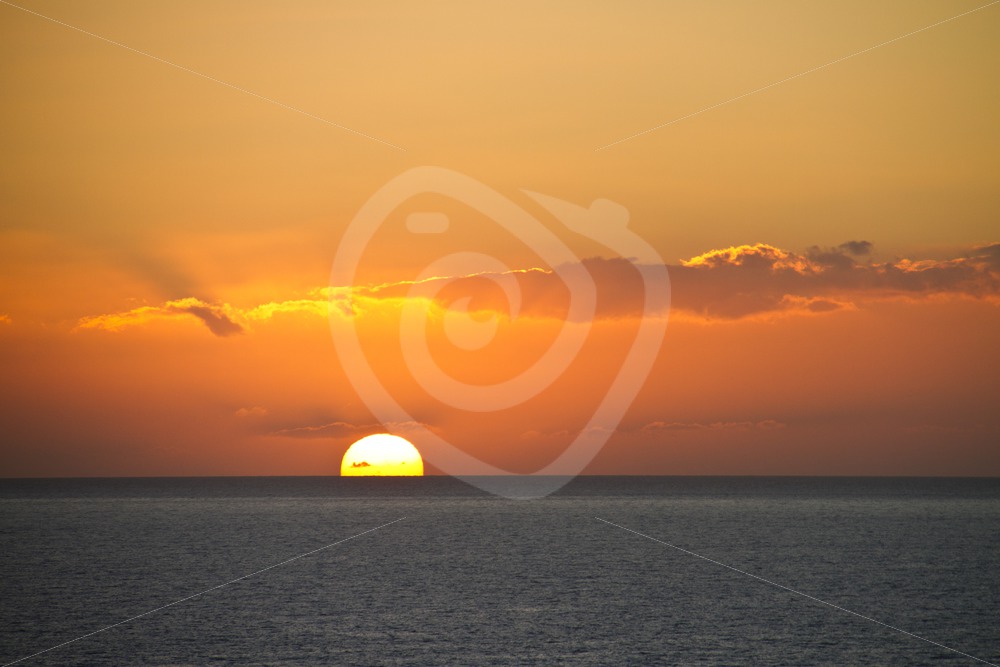 Sunset over the ocean - Nature Stock Photo Agency