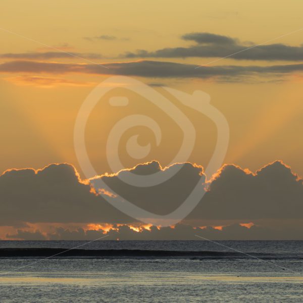 Mauritian sunset with shining clouds - Nature Stock Photo Agency