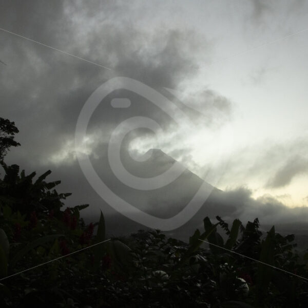 Arenal volcano during sunrise early in the morning, La Fortuna, Costa Rica - Nature Stock Photo Agency